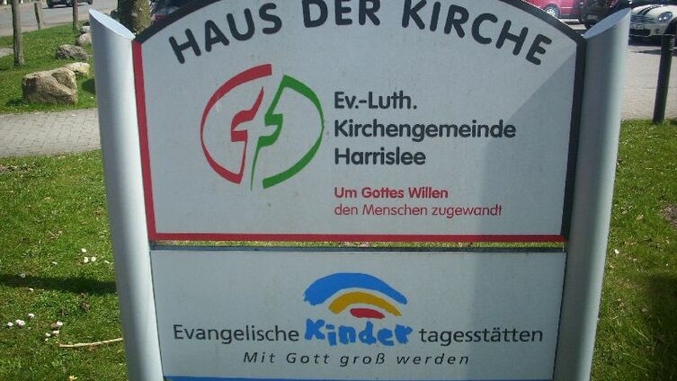 Haus der Kirche Schild